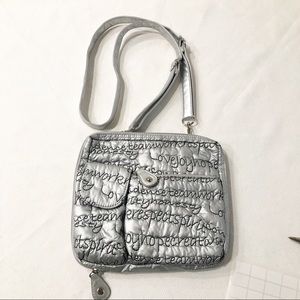 Chico’s Silver Crossbody Travel Bag W Black Script